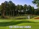 Fox Creek golf course with scenic landscaping and water features at 332 Symphony Se Way, Smyrna, GA 30080