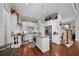 Spacious kitchen with granite island, stainless steel appliances, and white cabinetry at 332 Symphony Se Way, Smyrna, GA 30080