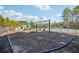 Community playground with swings and play structure at 5785 Stephens Mill Dr, Sugar Hill, GA 30518