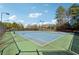 Two well-maintained tennis courts at 5785 Stephens Mill Dr, Sugar Hill, GA 30518