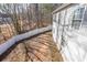 Backyard view of house and a long white fence at 1765 Rubye Lee Ln, Dacula, GA 30019