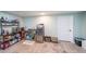 Basement kitchenette with refrigerator, microwave and sink at 1765 Rubye Lee Ln, Dacula, GA 30019