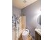 Clean bathroom with tub shower, toilet and vanity at 1765 Rubye Lee Ln, Dacula, GA 30019