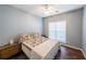 Charming bedroom with wood floors and a queen bed at 1765 Rubye Lee Ln, Dacula, GA 30019