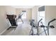 Basement exercise room with treadmill and other equipment at 1765 Rubye Lee Ln, Dacula, GA 30019