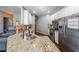 Modern kitchen with granite countertops and white cabinets at 1765 Rubye Lee Ln, Dacula, GA 30019