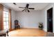 Cozy dining area featuring hardwood floors, a modern ceiling fan, and access to the kitchen at 1850 Cashmere Ct, Lithonia, GA 30058