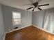 Bedroom with hardwood floors and a window with natural light at 2244 Alpha Dr, Decatur, GA 30032