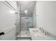 Bathroom with marble tile, a glass shower, and a floating vanity at 2515 Habersham Nw Rd, Atlanta, GA 30305