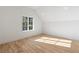 Bright bedroom with hardwood floors and large window at 2515 Habersham Nw Rd, Atlanta, GA 30305