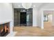 Elegant entryway with glass-paned doors and hardwood floors at 2515 Habersham Nw Rd, Atlanta, GA 30305