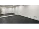 Basement exercise room with mirrored wall and rubber flooring at 2515 Habersham Nw Rd, Atlanta, GA 30305