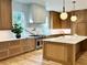 Gourmet kitchen boasts custom cabinetry, marble countertops, stainless steel appliances, and a large center island at 2515 Habersham Nw Rd, Atlanta, GA 30305