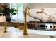 Close-up of a gourmet kitchen featuring marble backsplash, stainless steel appliances, and brass fixtures at 2515 Habersham Nw Rd, Atlanta, GA 30305