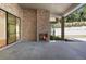 Brick fireplace and patio with sitting area, adjacent to pool at 2515 Habersham Nw Rd, Atlanta, GA 30305