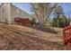 Sloped backyard with wooden deck at 4018 Bayside Cir, Atlanta, GA 30340