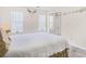 Bedroom with queen bed, mirrored closet doors at 4018 Bayside Cir, Atlanta, GA 30340