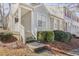 Inviting townhouse entrance with steps and landscaping at 4018 Bayside Cir, Atlanta, GA 30340