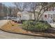 Gray siding townhouse with stone accents, steps, and landscaping at 4018 Bayside Cir, Atlanta, GA 30340