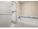 Updated bathroom with a shower and a bathtub at 2519 Lauderdale Ne Dr, Atlanta, GA 30345