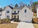 Beautiful two-story home with a well-manicured lawn and two car garage at 2865 Ferncliff St, Cumming, GA 30028