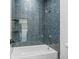 Bathroom with a shower/tub combo and herringbone tile at 3378 Bachelor St, Atlanta, GA 30344
