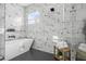 Modern bathroom with marble tile and freestanding tub at 3378 Bachelor St, Atlanta, GA 30344
