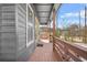 Charming front porch with wood decking and railings at 3378 Bachelor St, Atlanta, GA 30344