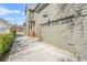 Attached garage with concrete driveway and exterior lighting at 3378 Bachelor St, Atlanta, GA 30344