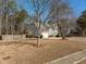 House with two-car garage and a front yard at 3408 Sandlake Dr, Marietta, GA 30008