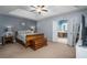 Main bedroom with ensuite bathroom and tray ceiling at 3408 Sandlake Dr, Marietta, GA 30008