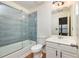 Clean bathroom with a tub/shower combo and white vanity at 887 Commonwealth Se Ave, Atlanta, GA 30312