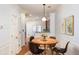 Bright dining room with wood table and four chairs at 887 Commonwealth Se Ave, Atlanta, GA 30312