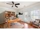 Spacious home office with built-in shelving and hardwood floors at 887 Commonwealth Se Ave, Atlanta, GA 30312