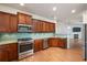 Modern kitchen with granite counters and stainless steel appliances at 887 Commonwealth Se Ave, Atlanta, GA 30312