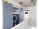 Convenient laundry area with washer, dryer, and barn-style doors at 887 Commonwealth Se Ave, Atlanta, GA 30312