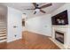 Living room with hardwood floors, fireplace, and built-in shelving at 887 Commonwealth Se Ave, Atlanta, GA 30312