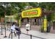 Zoo Atlanta entrance with visitors arriving at 887 Commonwealth Se Ave, Atlanta, GA 30312