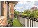 Apartment balcony featuring artificial turf, city views, and wrought iron railing at 3235 Roswell Ne Rd # 615, Atlanta, GA 30305