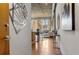 Hallway view of the home with wood floors leading into an open layout at 3235 Roswell Ne Rd # 615, Atlanta, GA 30305