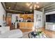 Open-concept living area blends living, dining, and kitchen spaces with modern design and ample natural light at 3235 Roswell Ne Rd # 615, Atlanta, GA 30305