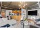 Open-concept living area blends living, dining, and kitchen spaces with modern design and ample natural light at 3235 Roswell Ne Rd # 615, Atlanta, GA 30305