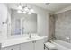 Clean bathroom with a single sink vanity and shower/tub combo at 1078 Meadow Brook Dr, Woodstock, GA 30188