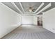 Spacious bedroom with carpeted floors and ceiling fan at 1078 Meadow Brook Dr, Woodstock, GA 30188