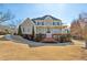 Two-story house with brick accents and a landscaped lawn at 1078 Meadow Brook Dr, Woodstock, GA 30188