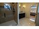 Luxurious bathroom with a double vanity and marble floors at 1122 Nw Rice Nw St, Atlanta, GA 30318