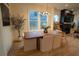Dining room with hardwood floors, a farmhouse table, and a modern chandelier at 1122 Nw Rice Nw St, Atlanta, GA 30318