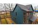 Side view showcasing the home's dark blue siding and large windows at 1122 Nw Rice Nw St, Atlanta, GA 30318