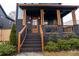 Attractive exterior with a welcoming front porch and landscaping at 1122 Nw Rice Nw St, Atlanta, GA 30318
