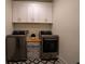 Convenient laundry room with washer, dryer, and storage at 1122 Nw Rice Nw St, Atlanta, GA 30318